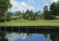 photo the golf course and clubhouse in Legend Oaks